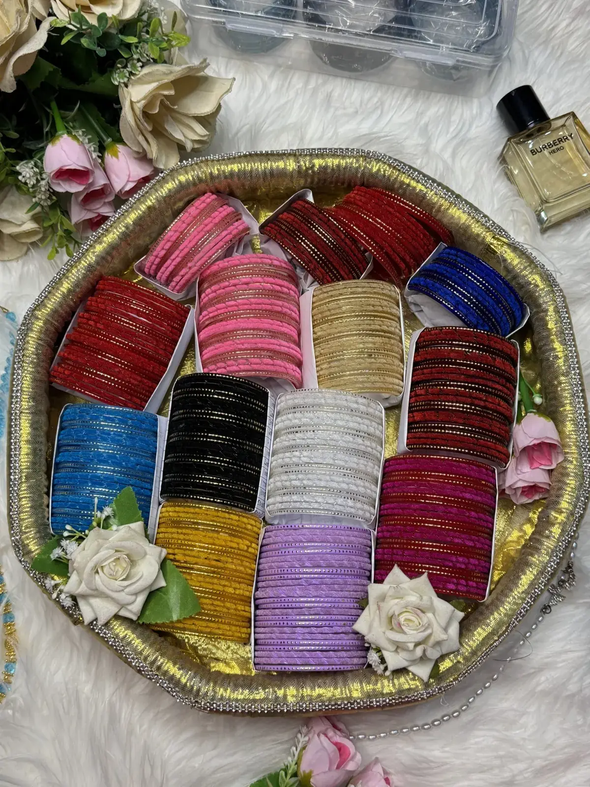 Assorted Indian glass velvet bangles with fine gold dotted details
